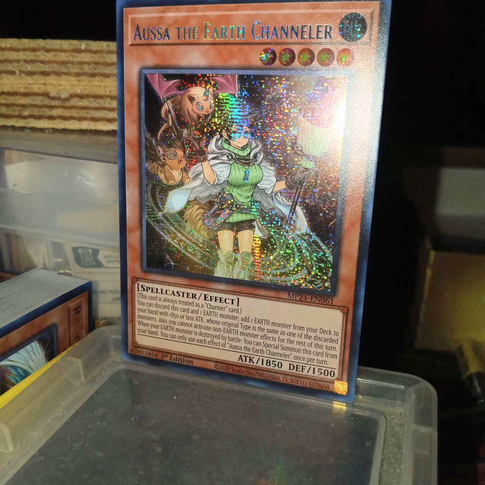 Aussa the Earth Channeler MP24-EN061 25th Anniversary Tin Dueling Mirrors 1st Ed